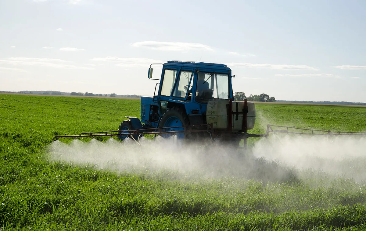 Crop sprayer operating in a field